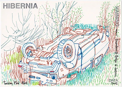 A colored pen drawing showing an upside-down car wreck in a grassy ditch, its undercarriage and wheels exposed. The scene is rendered in blue, brown, green, and teal lines suggesting tangled vegetation and bare spring branches. "HIBERNIA" is stamped at top left, "HAINING" runs vertically on the right edge, and text identifies the location as "near Drumherriff Bridge, Co. Leitrim." Dated "Tuesday 23rd April" with "DATA 2002" at bottom right.